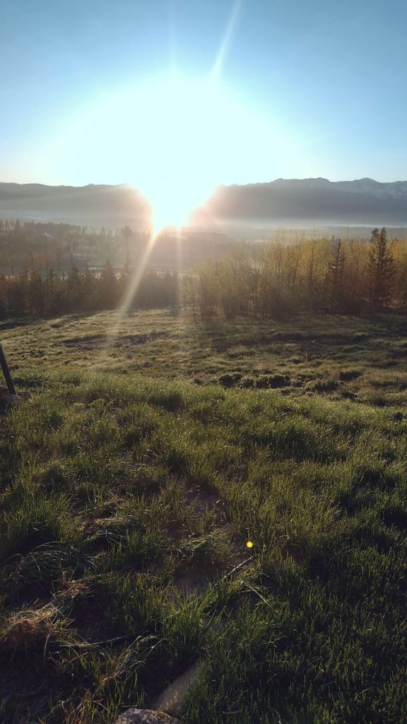 sunset behind mountains